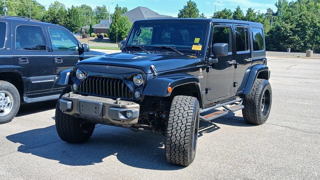 Used 2016 Jeep Wrangler Unlimited 75th Anniversary Edition with VIN 1C4BJWEG6GL209735 for sale in Roxboro, NC